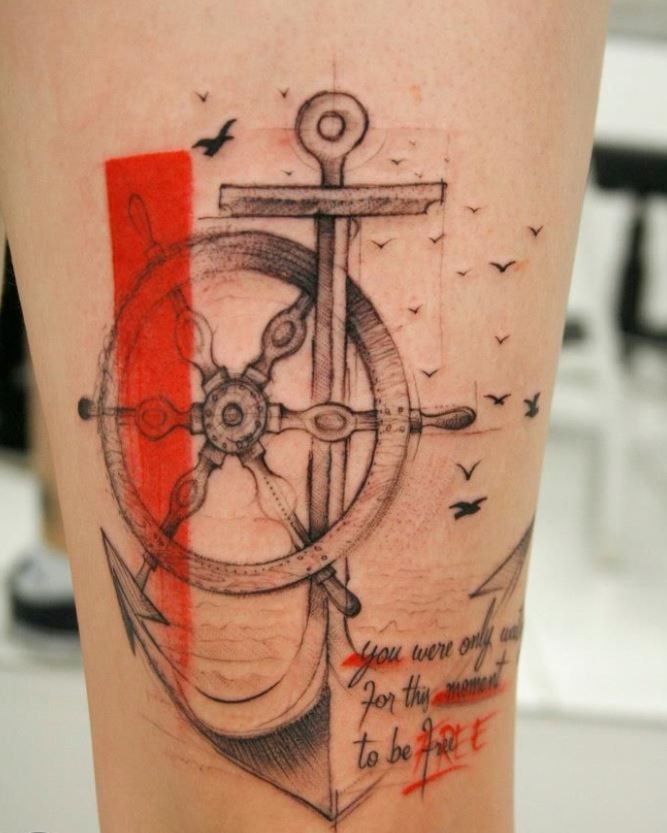 腿部船舵与船锚和字母纹身图案