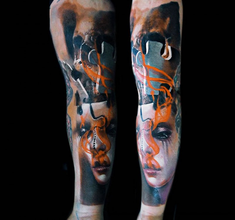 手臂抽象风格的彩色女人面具拼图纹身图案
