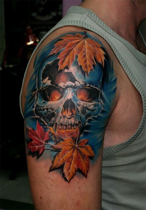 手臂骷髅与天然枫叶彩色写实纹身图案