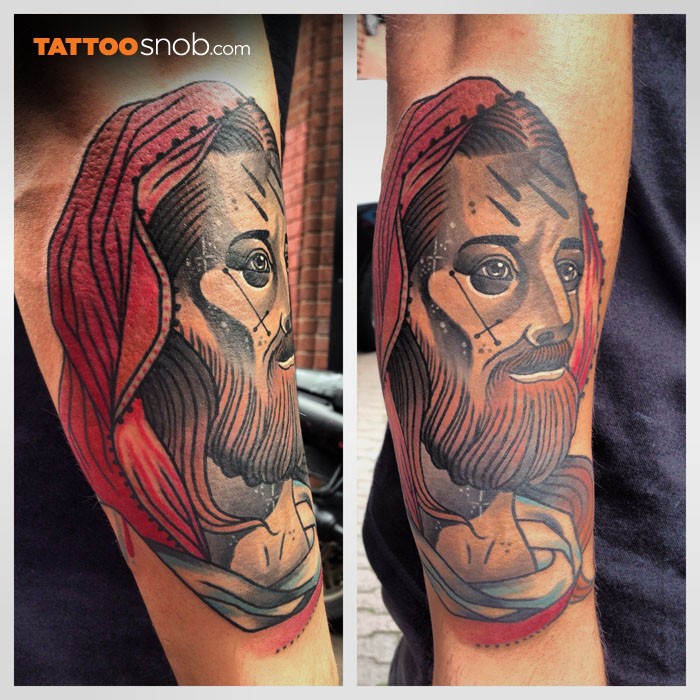 新传统风格的彩色耶稣头像手臂纹身图案