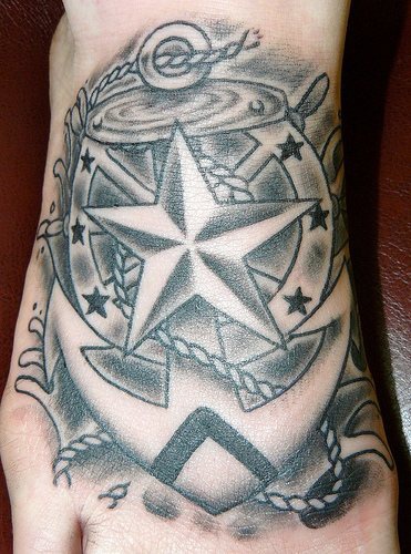 脚背星星和船锚海浪装饰纹身图案