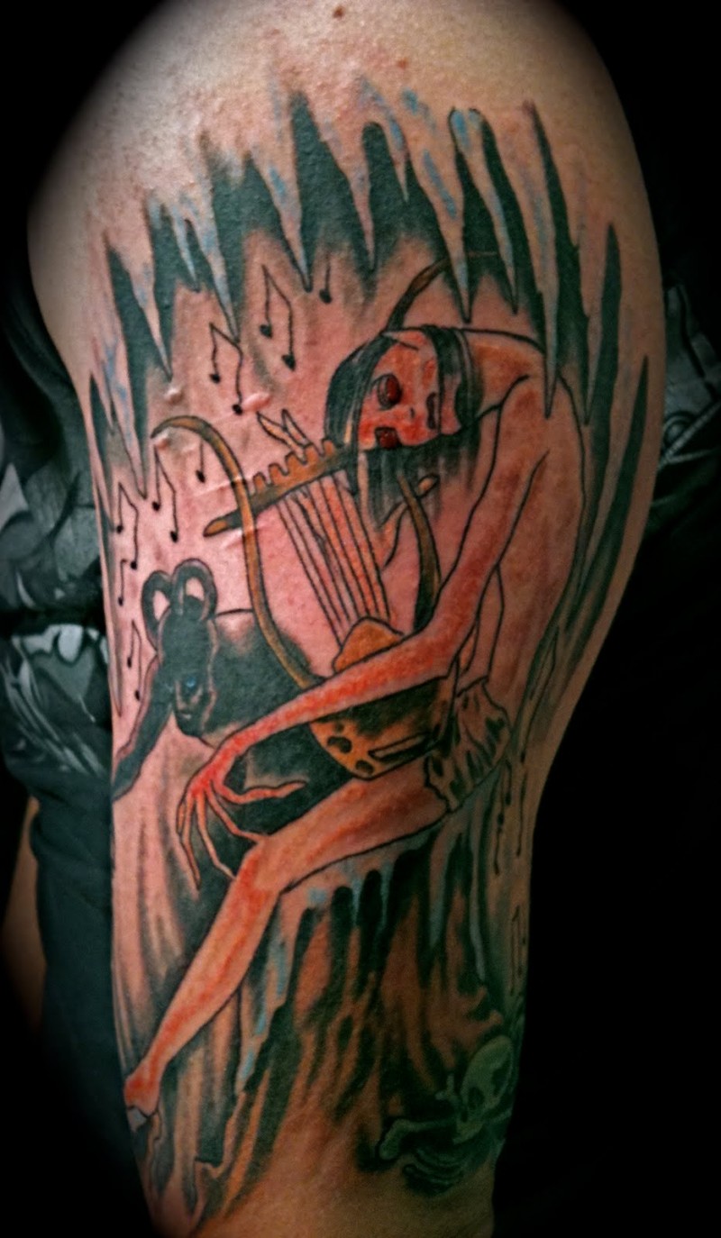 个性彩色古典音乐家手臂纹身图案