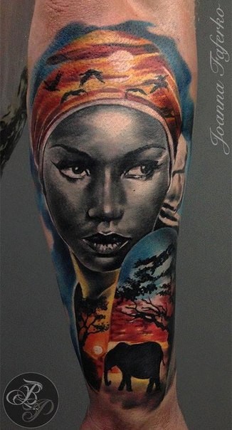 手臂彩色的非洲女人肖像和风景纹身图案