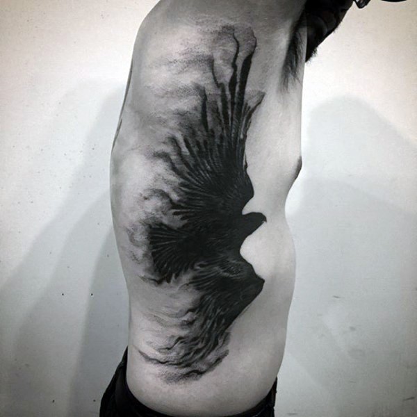 侧肋抽象风格神秘的黑色鸟纹身图案