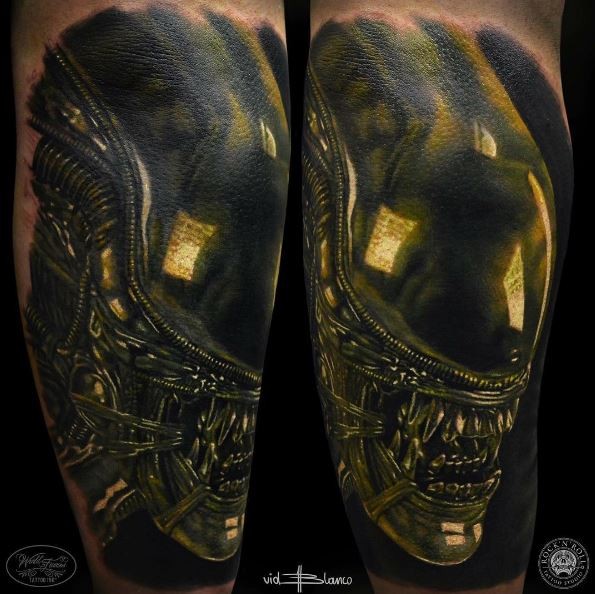 手臂3D风格的外星人头纹身图案