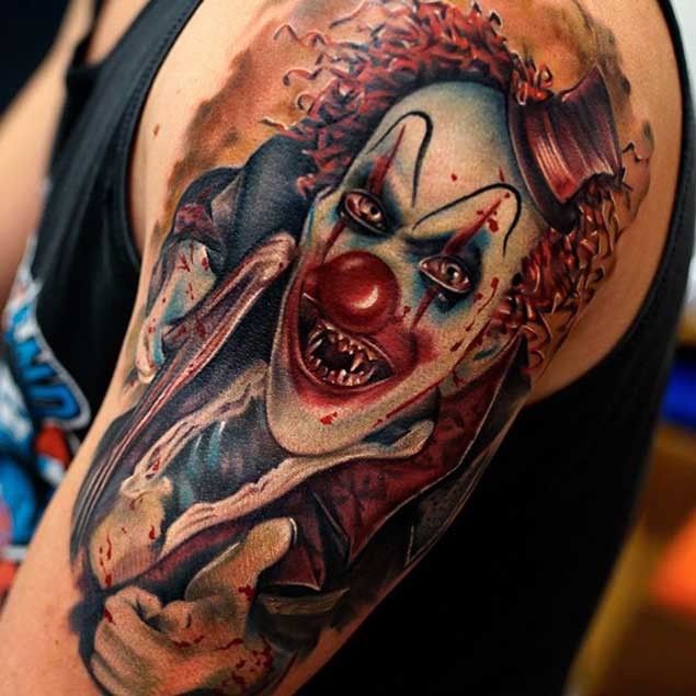 手臂彩色的邪恶小丑纹身图案