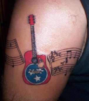 美国风格的吉他与音符纹身图案
