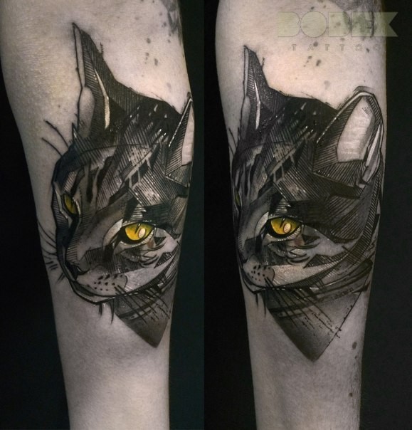 手臂黄眼睛的猫咪头像纹身图案