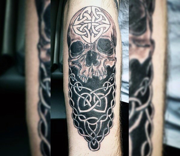 黑白神秘骷髅与凯尔特装饰手臂纹身图案