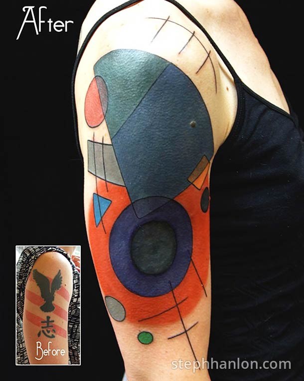 手臂抽象风格的各色圆形纹身图案