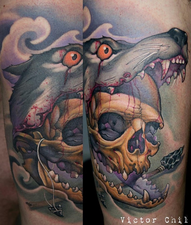 手臂彩色人类骷髅在狼嘴里纹身图案