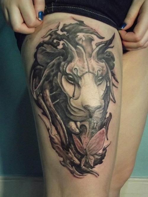大腿3D彩色的恶魔狮子和蝴蝶纹身图案