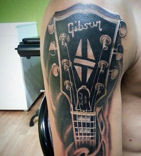 手臂非常写实的黑色个性吉普森吉他纹身图案