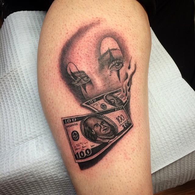 小腿3D黑色小丑面具和美元纹身图案