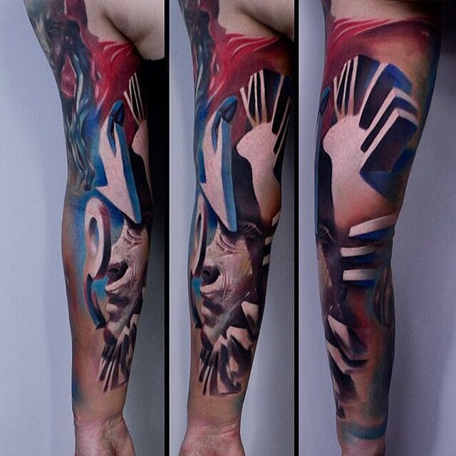 手臂抽象风格的彩色的人像纹身图案
