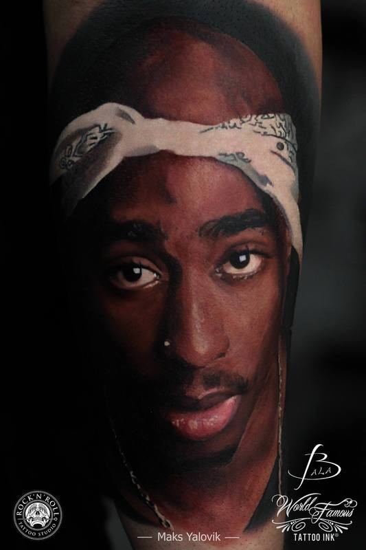 非常逼真的彩绘非洲男子肖像手臂纹身图案