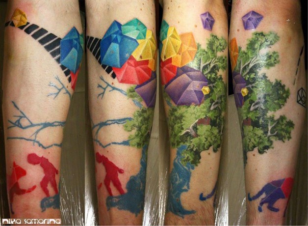 手臂抽象风格的彩色钻石和大树纹身图案