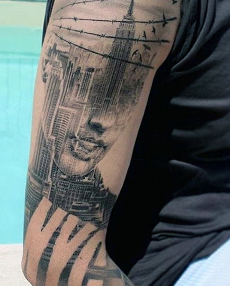 手臂女人肖像结合美国大城市纹身图案