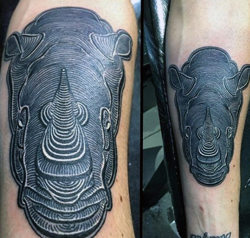 手臂雕刻风格黑色的3D犀牛纹身图案