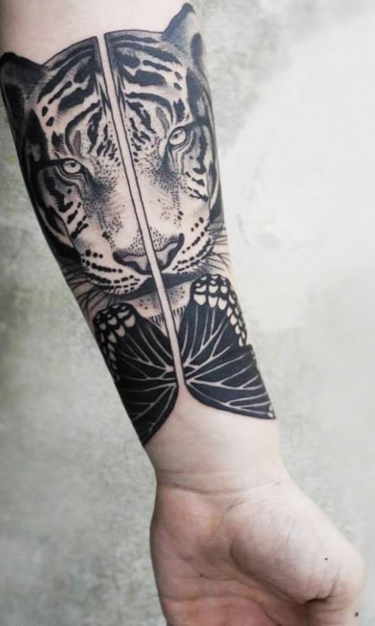 小臂自然美丽的黑色老虎和蝴蝶纹身图案