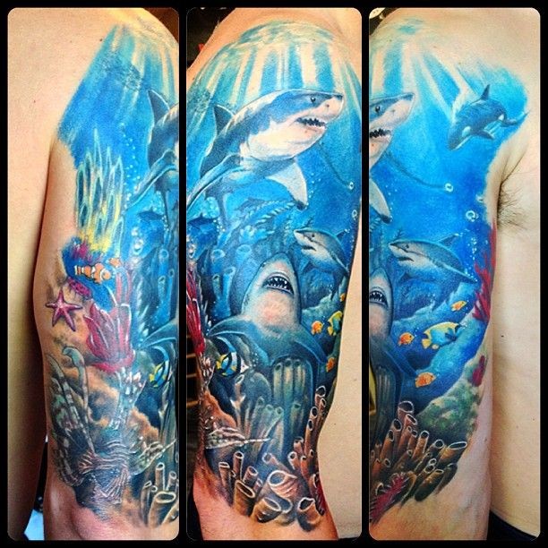 大臂色彩斑斓的海底逼真鲨鱼纹身图案
