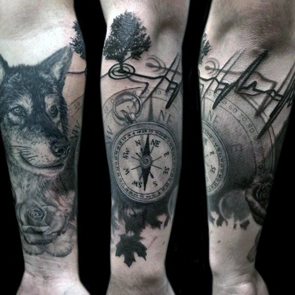 手臂令人印象深刻的指南针狼和心电图纹身图案