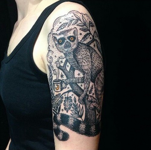 精彩的黑白狐猴和树枝手臂纹身图案