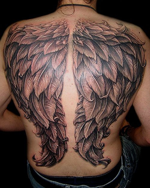 背部精致的黑色翅膀纹身图案