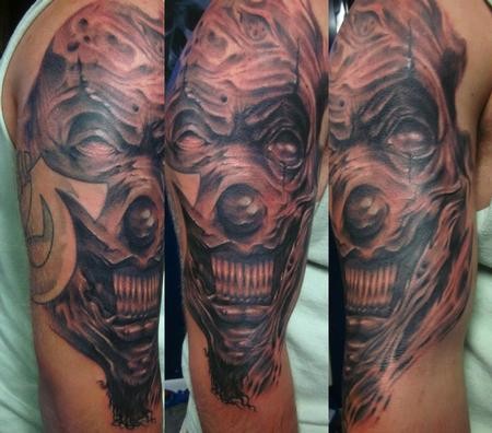 疯狂怪异的小丑手臂纹身图案