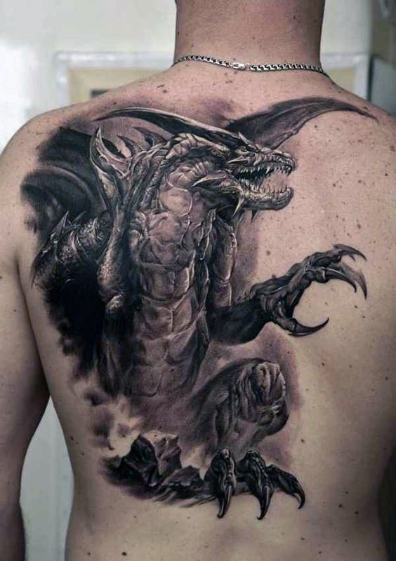 背部奇特精致的幻想龙纹身图案
