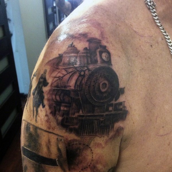 肩部很酷的火车与骑马牛仔纹身图案