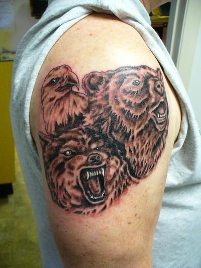 大臂野蛮鹰狼熊头像纹身图案