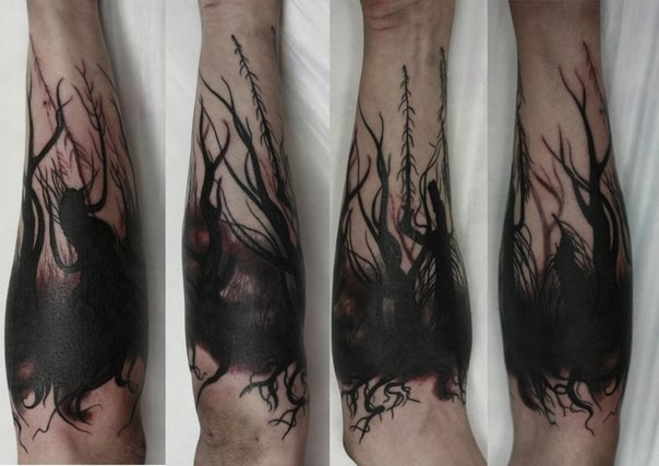手臂简单的黑色神秘森林纹身图案