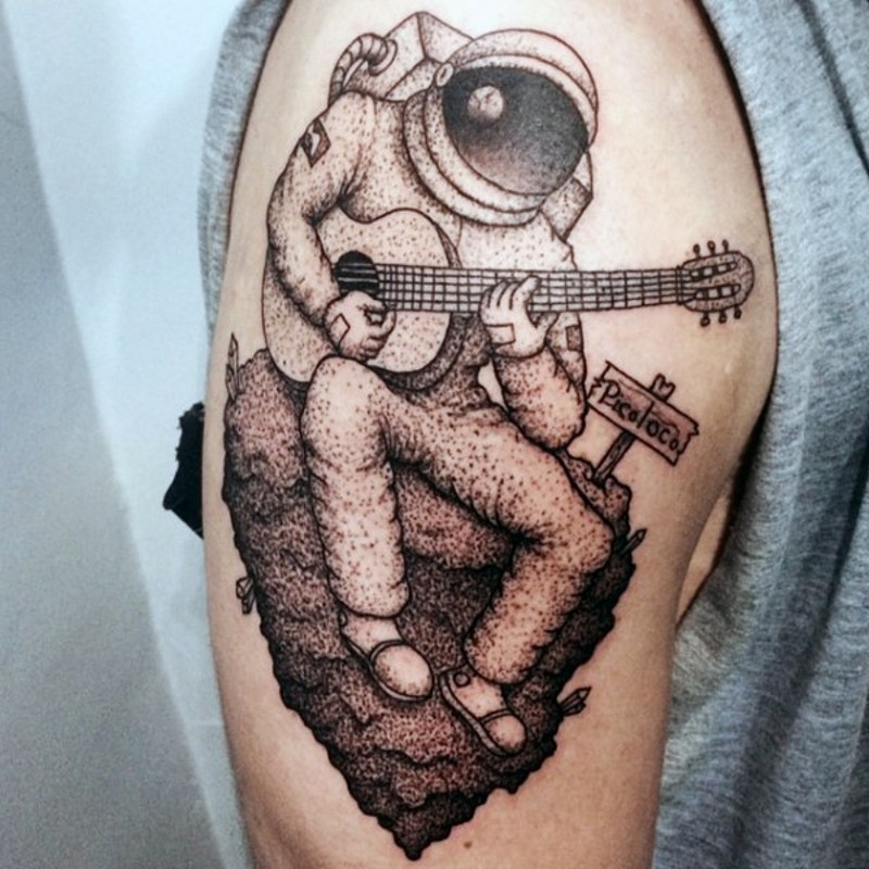 手臂简单的黑白点刺宇航员玩吉他纹身图案