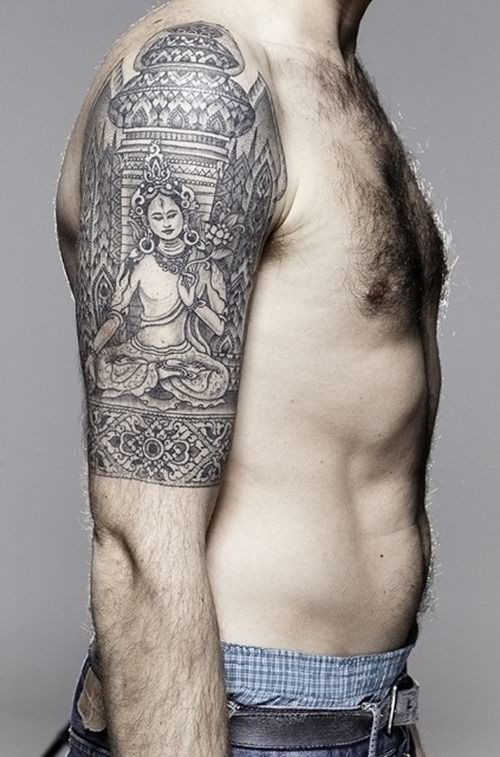 手臂上的佛教风格纹身图案