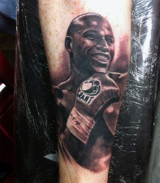 逼真的黑色著名拳击手肖像手臂纹身图案
