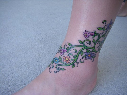 小腿美丽的花卉植物纹身图案