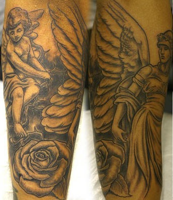 黑色的小天使与玫瑰手臂纹身图案