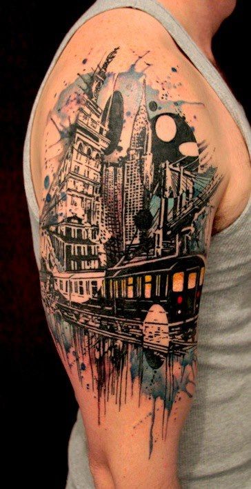 手臂上令人敬畏的城市景观纹身图案