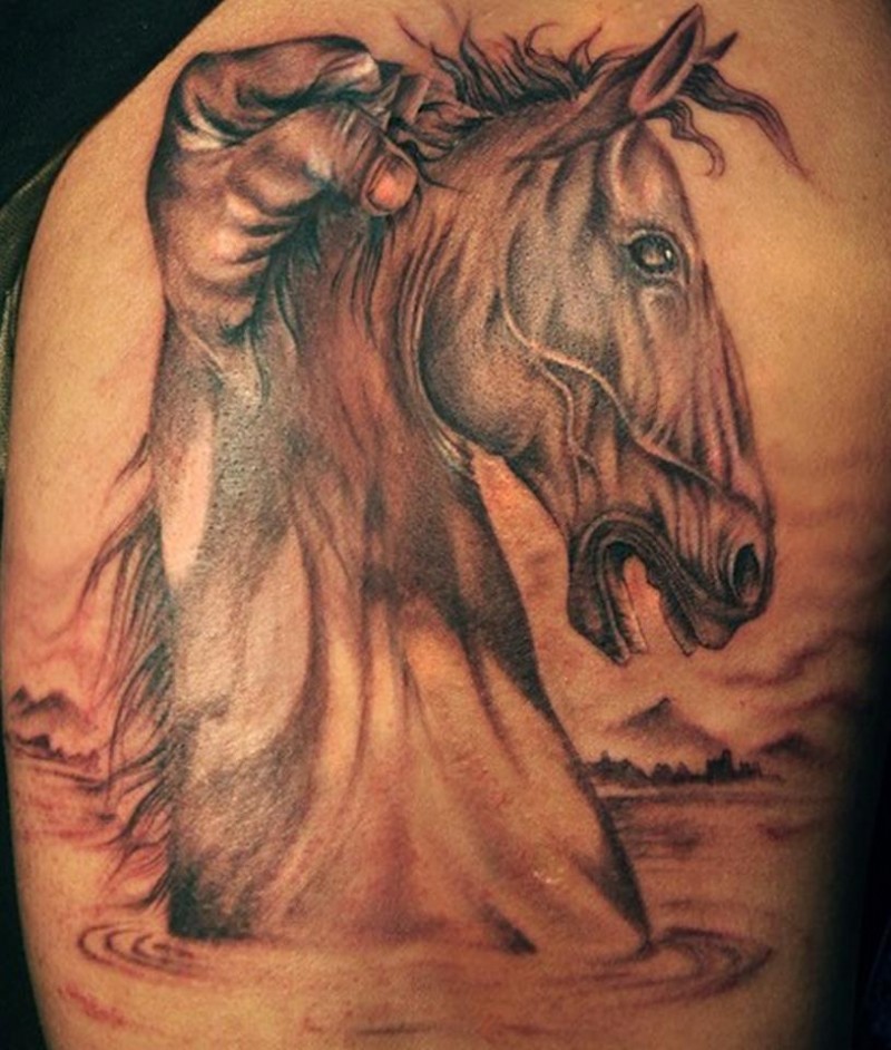 个性独特的马和手纹身图案