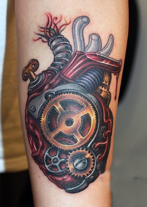 小臂惊人的彩色机械式心脏纹身图案
