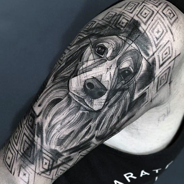 大臂黑色线条狗头像纹身图案