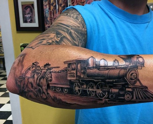 黑色的火车与西部牛仔手臂纹身图案