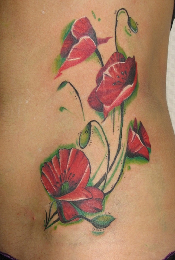 腰部浅红色的罂粟花纹身图案