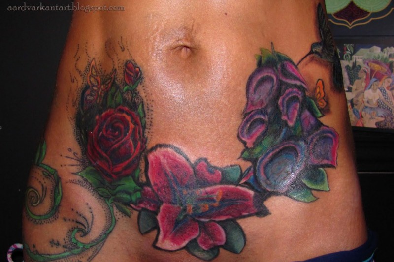 腹部美丽生动彩色各种花卉纹身图案