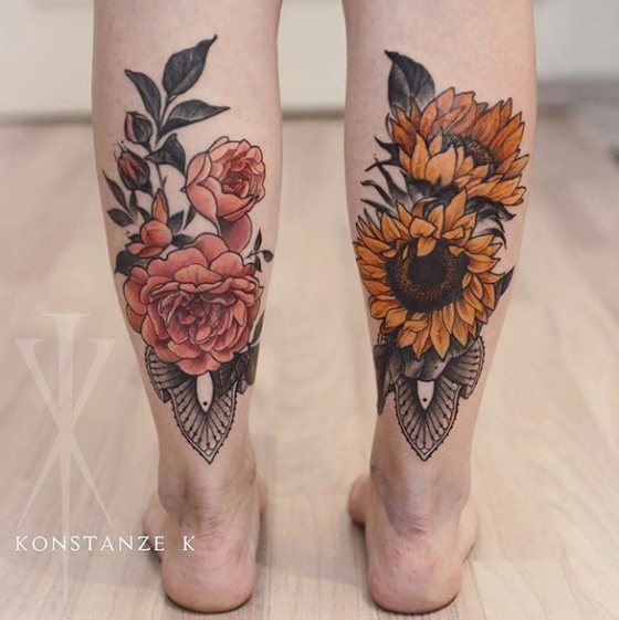 小腿彩色不同的美丽花朵纹身图案