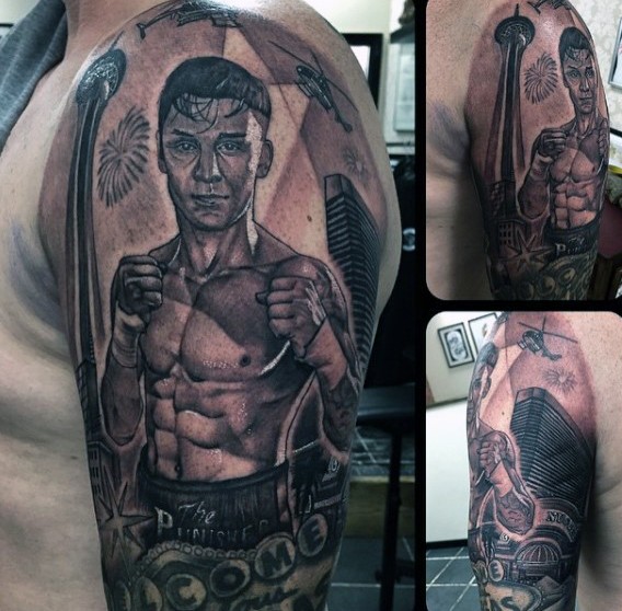 手臂手绘黑色拳击手与城市纹身图案