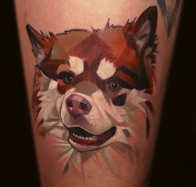 大腿卡通彩色狗头像纹身图案