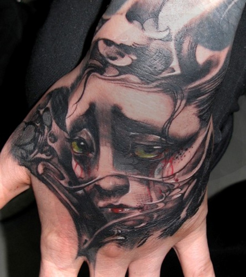 手背彩绘亚洲艺妓肖像纹身图案