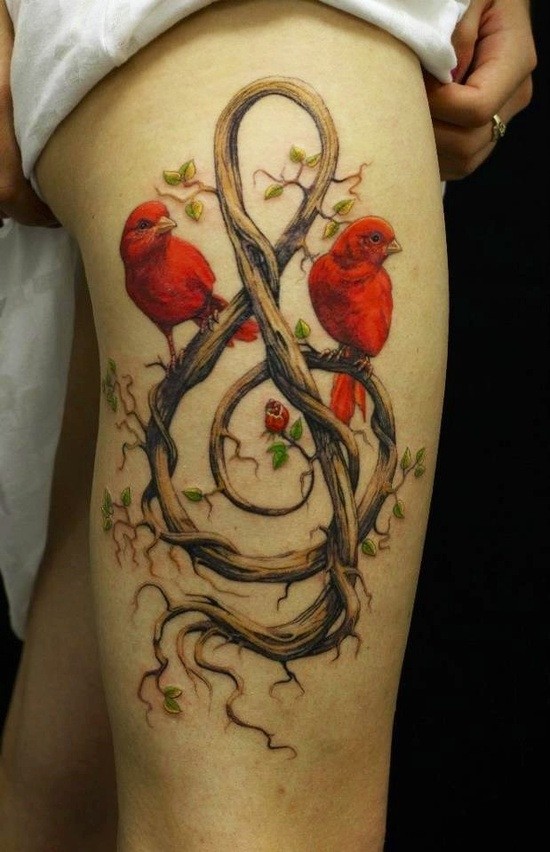 大腿黑色的小鸟和高音符号藤蔓纹身图案